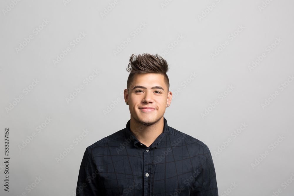 Obraz premium studio portrait of a confident young man 