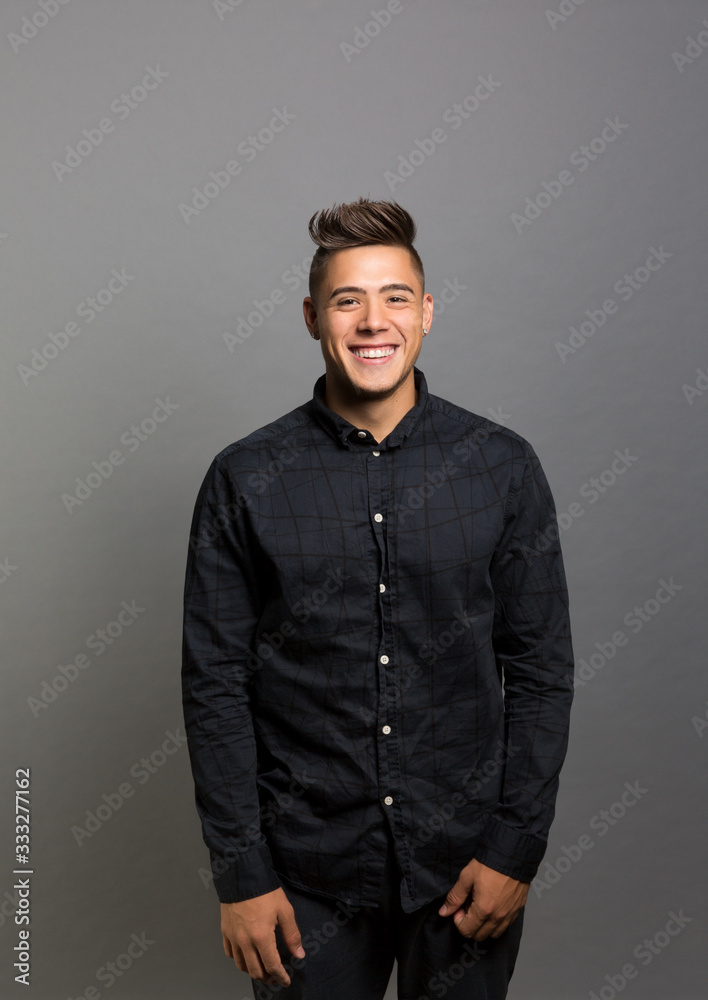 Obraz premium studio portrait of an excited young man 