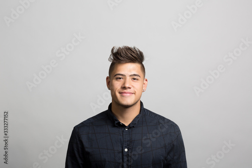 studio portrait of a confident young man 