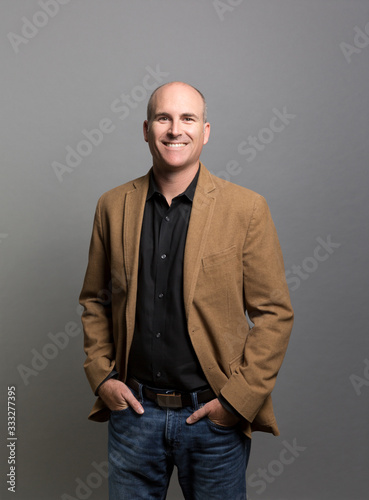 studio portrait of a happy businessman