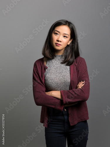 Studio portrait of a young woman contemplating