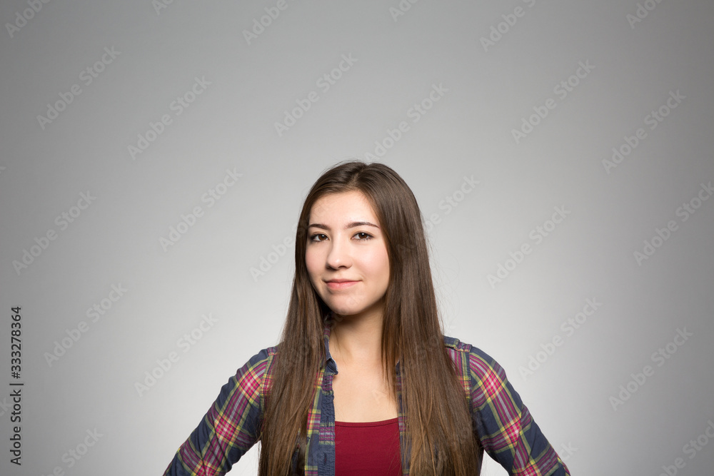 Obraz premium Studio portrait of a confident young woman