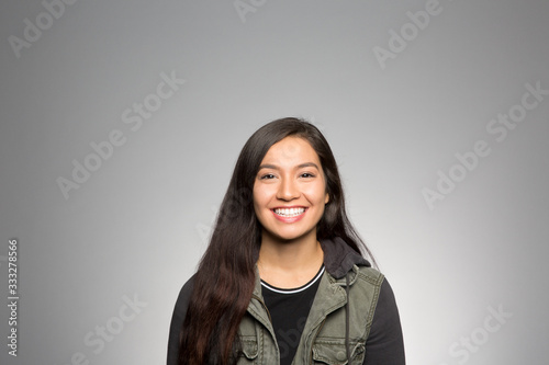 Photography Studio portrait of an excited young woman
