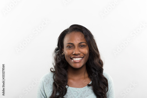 Studio portrait of a young woman smiling 