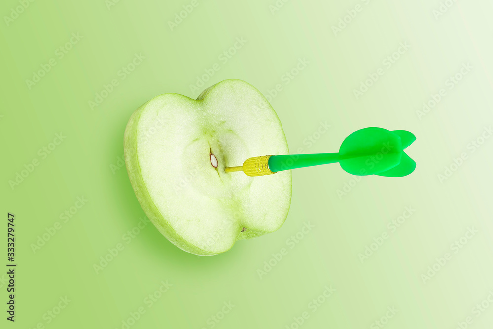 green apple with dart