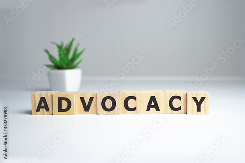 ADVOCACY word made with building blocks, business concept photo