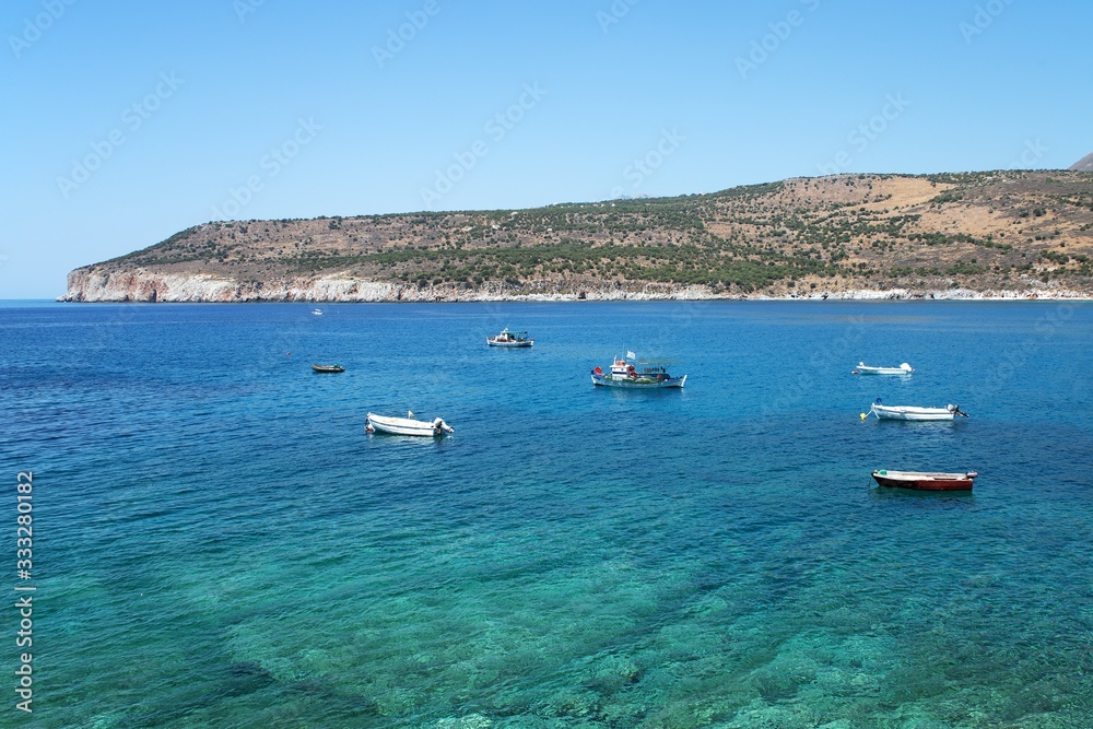Boats in the bay near Caves of Diros (Dirou), Peloponnese, Greece
