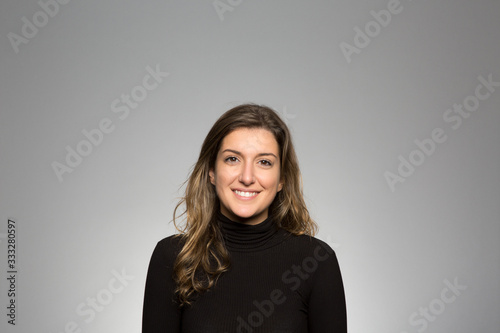 Studio portrait of a happy young woman