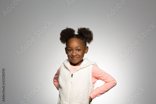 Studio portrait of a happy girl