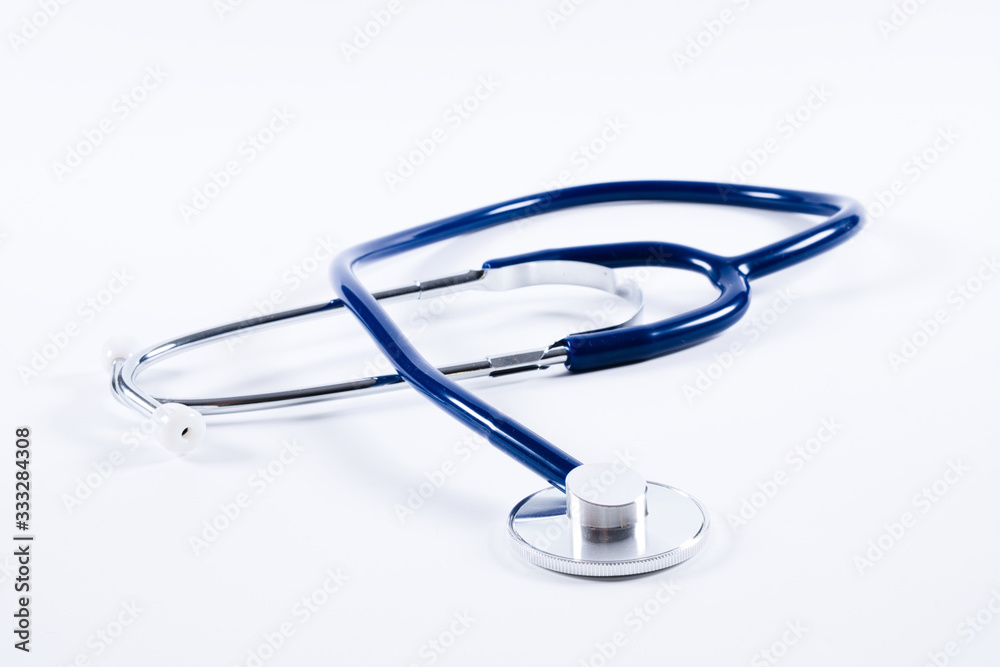 Stethoscope, blue stethoscope on white surface Stethoscope, blue stethoscope on white surface