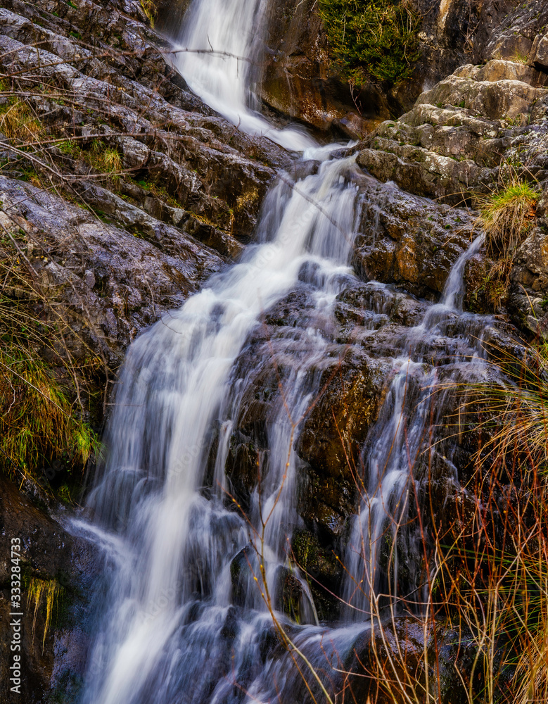 Naklejka premium waterfalls of clean water from the mountain