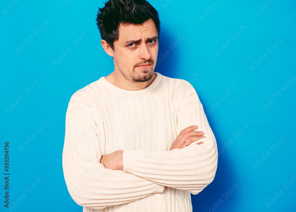 Portrait of a man arms folded