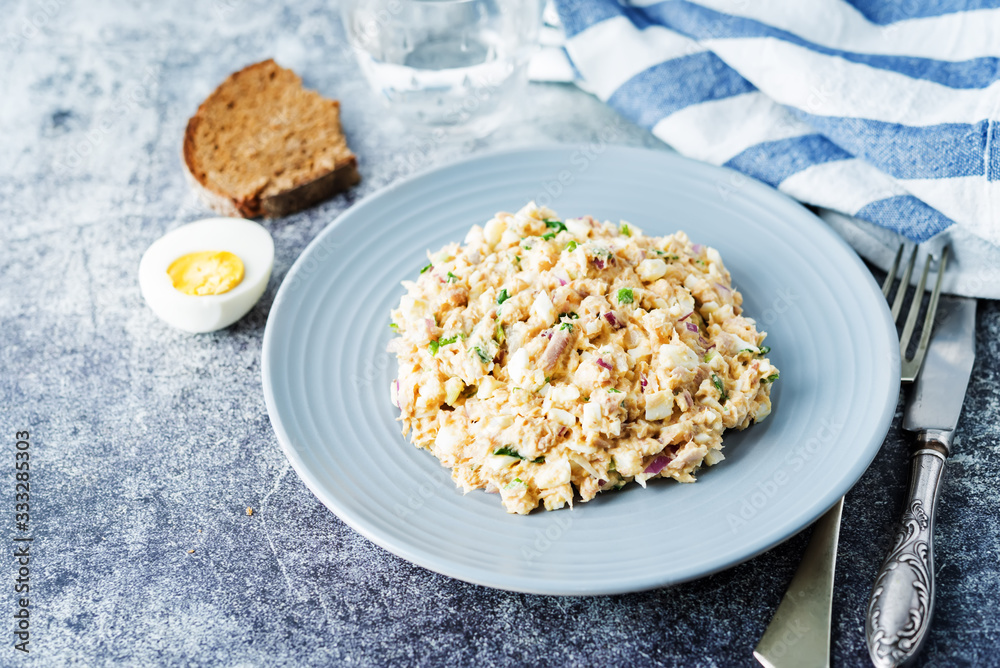 Canned Tuna red onion egg salad on the plate Canned Tuna red onion egg salad on the plate
