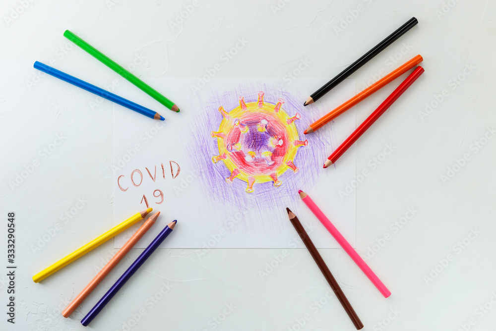 Covid-19 virus model drawn on a sheet of paper. Covid-19 virus model drawn on a sheet of paper.