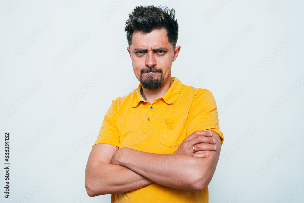 Portrait of a man arms folded