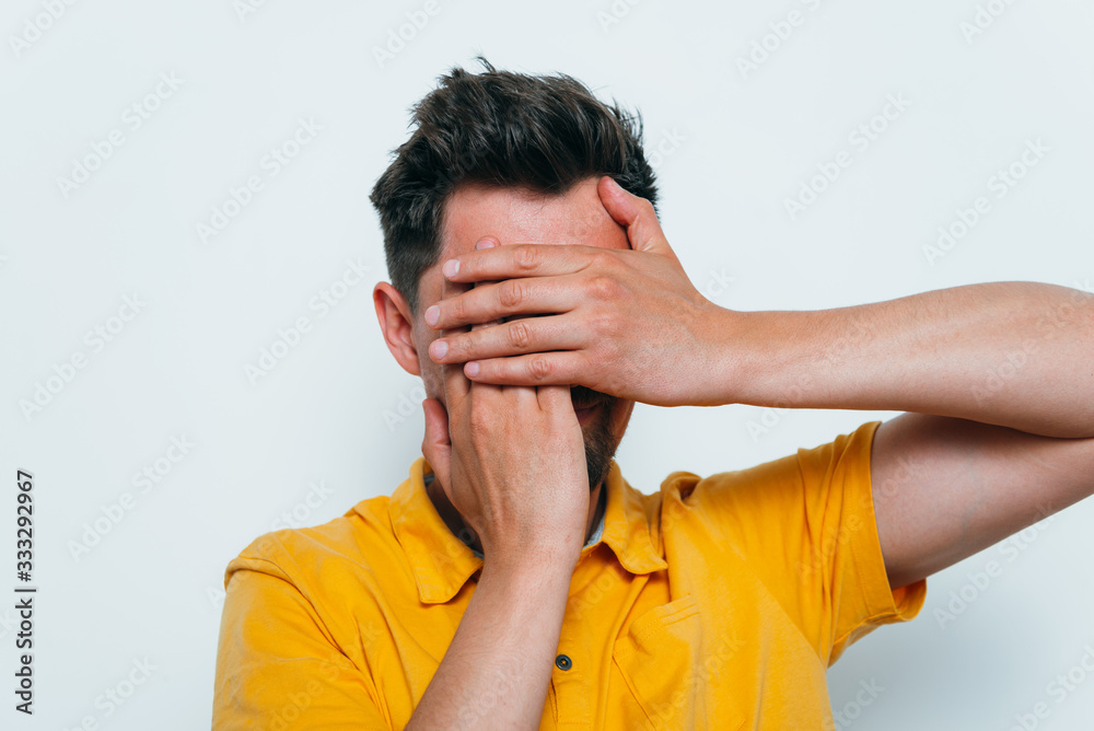 man covered his face with his hands man covered his face with his hands