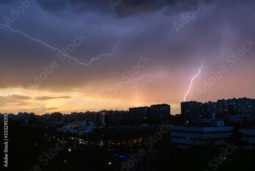 lightning and thunder over the city sunset storm Madrid