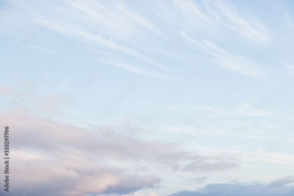 Blue sky with clouds background with soft focus. Spring backgorund. Empty background. Blue sky with clouds background with soft focus. Spring backgorund. Empty background.