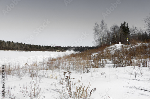 winter landscape with lake and trees © Weichen