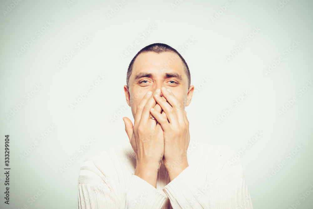 man laughs and covers her mouth man laughs and covers her mouth
