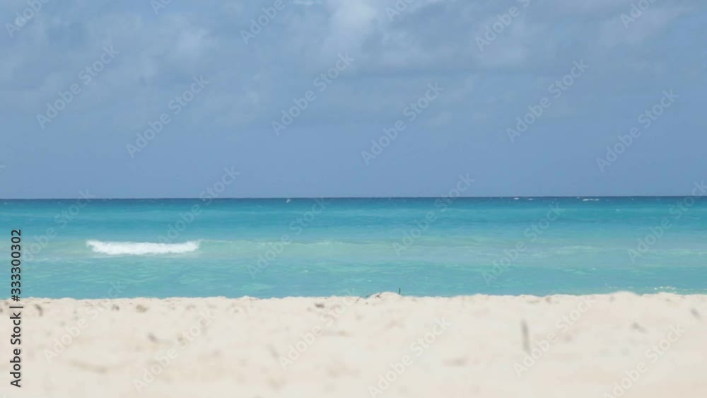 ocean waves on a sandy beach at summer day in tropical island ocean waves on a sandy beach at summer day in tropical island