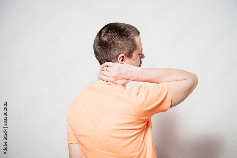 holding his head. The back man