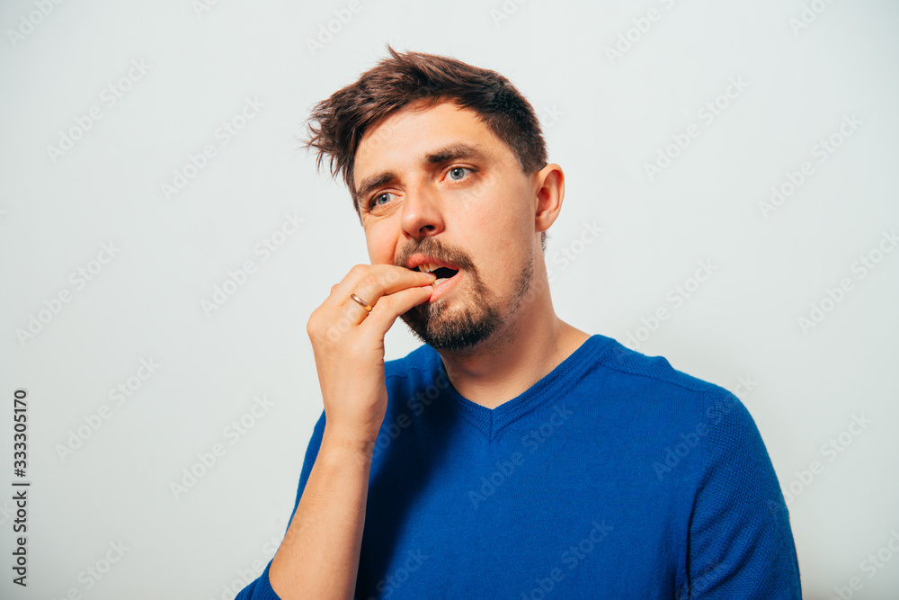 man bites his nails man bites his nails