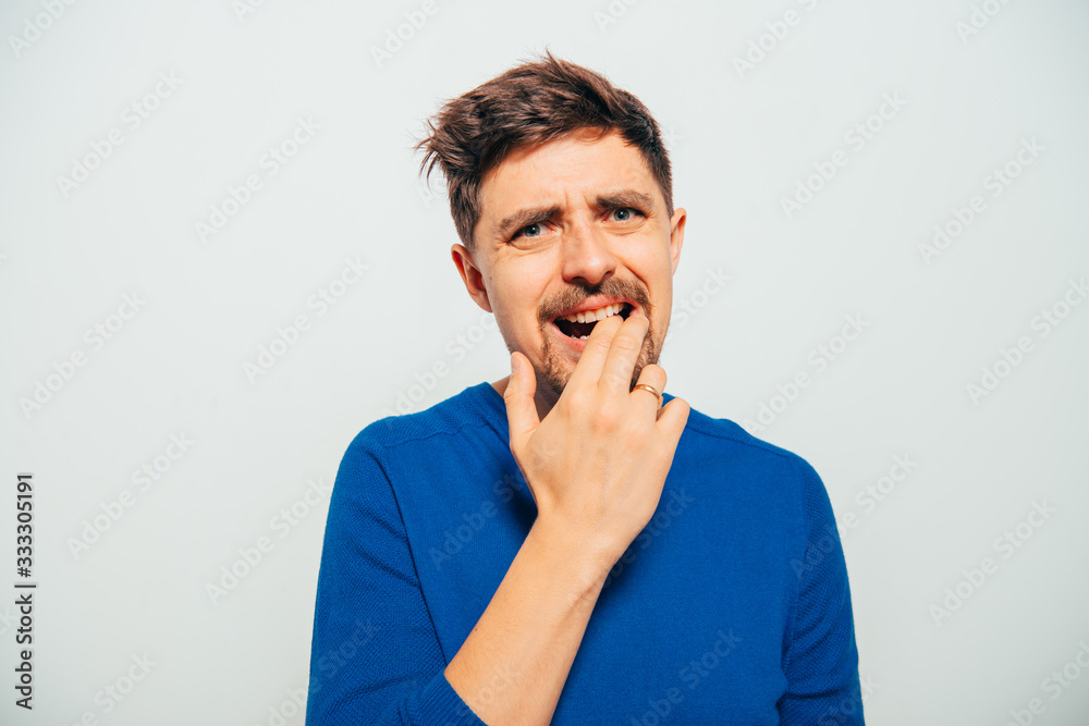 man bites his nails man bites his nails