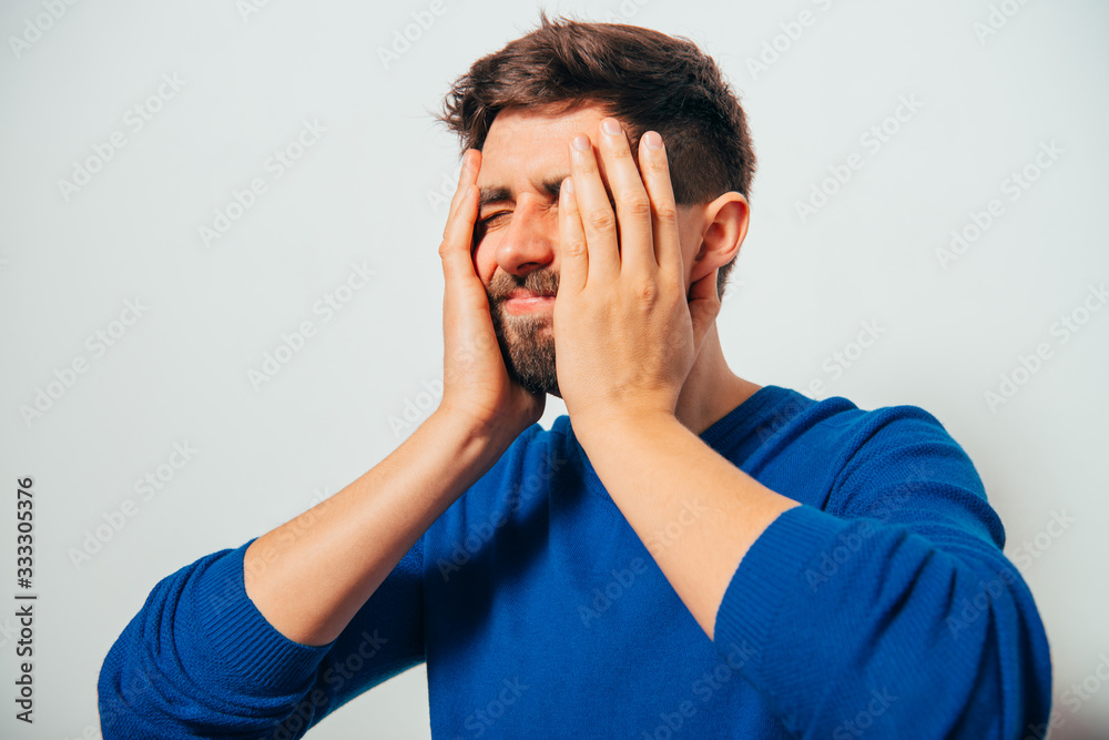 man covered his face with his hands man covered his face with his hands