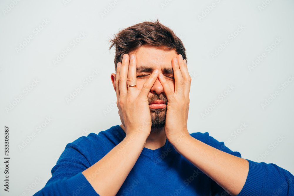 man covered his face with his hands man covered his face with his hands