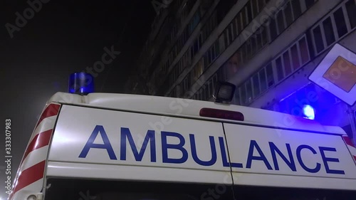 ambulance lights flicker at night