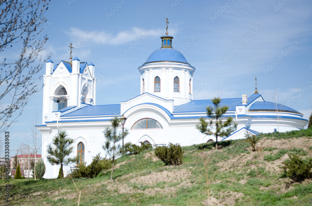 Christian monastery. Church with blue domes.