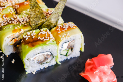 Sushi roll with eel and avo...
