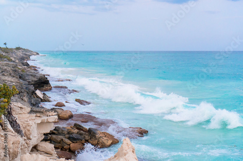 Sea shore and stones close background in Cuba photo