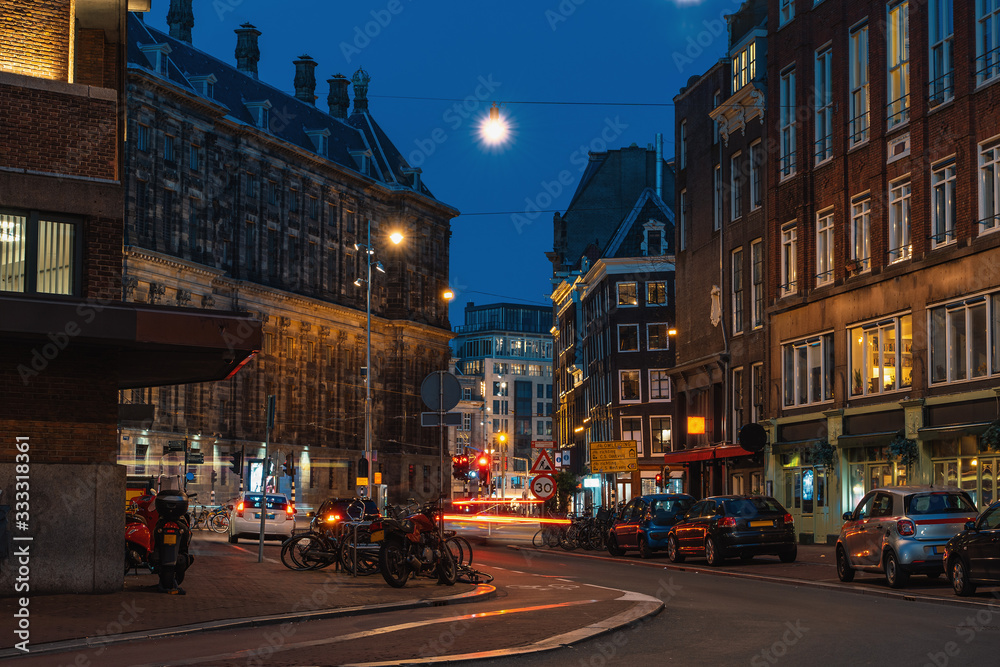 Fototapeta premium Empty Amsterdam downtown without people in evening. Netherlands coronavirus covid-19 outbreak, city in quarantine.