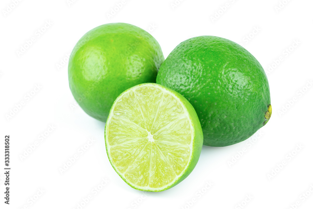 Lime with slices half isolated on white background. Green citrus fruit. with clipping path Lime with slices half isolated on white background. Green citrus fruit. with clipping path
