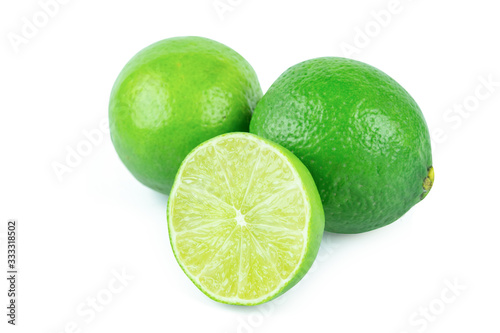 Lime with slices half isolated on white background. Green citrus fruit. with clipping path