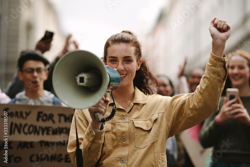 Urban woman protesting at a strike photo