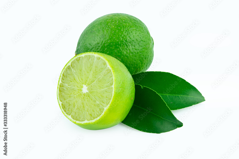 Lime with slices half and leaves isolated on white background. Green citrus fruit. with clipping path
