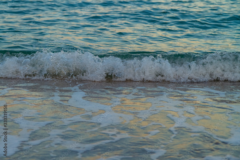 sea water with a wave tending to the shore sea water with a wave tending to the shore