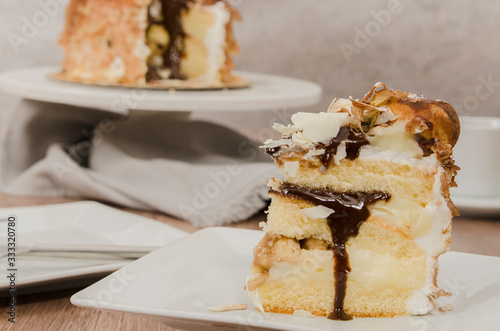 Birthday cake decorated with colorful sauce