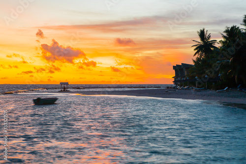 Sunset on Maldives, tropical island