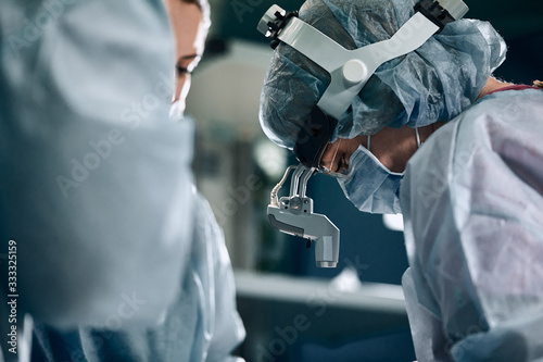 A shot of an emergency and a serious accident in the operating room, a team of surgeons makes an emergency operation to people in an accident. Saving lives, modern medetsina. photo