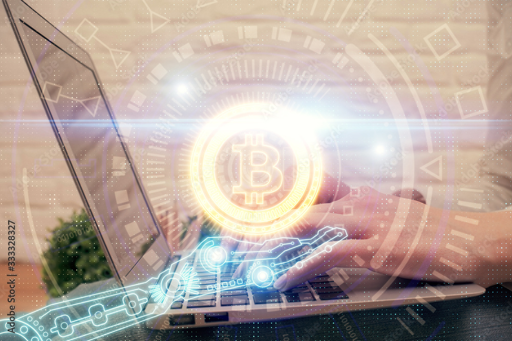 Double exposure of woman hands typing on computer and crypto market theme hologram drawing. Blockchain concept. Double exposure of woman hands typing on computer and crypto market theme hologram drawing. Blockchain concept.