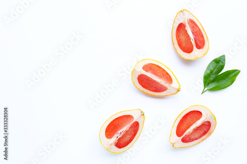 High vitamin C. Juicy grapefruit slices on white.