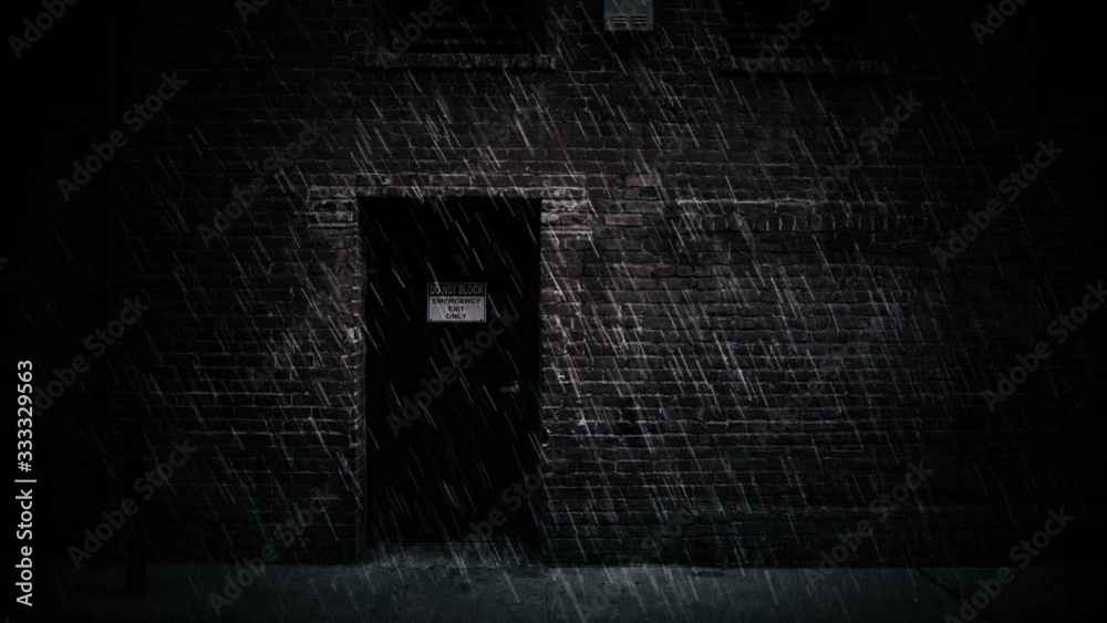 Looping windy heavy rain falling on urban city brick building ...