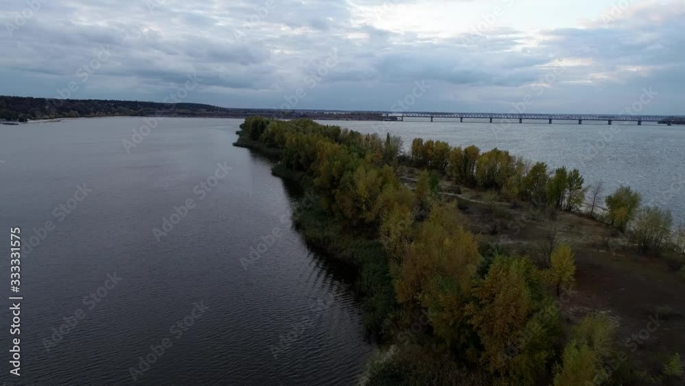 aerial shoot of small islands on river and yellow three 