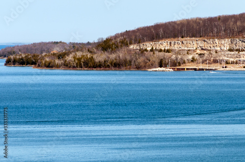 Title:  Distant view of Niagara Escarpment bluffs from Pottawatomi State Park, across Sturgeon Bay. photo