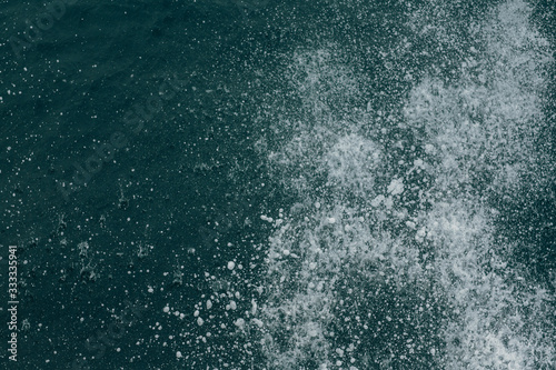 sea spray from under the boat