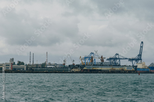 huge loading and unloading cranes in the seaport in Odessa © Nichita